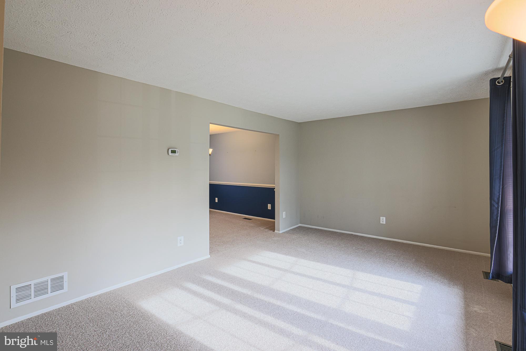 4402 Macworth Place Nottingham, MD 21236 - Photo 3 of 36 a view of an empty room and kitchen space