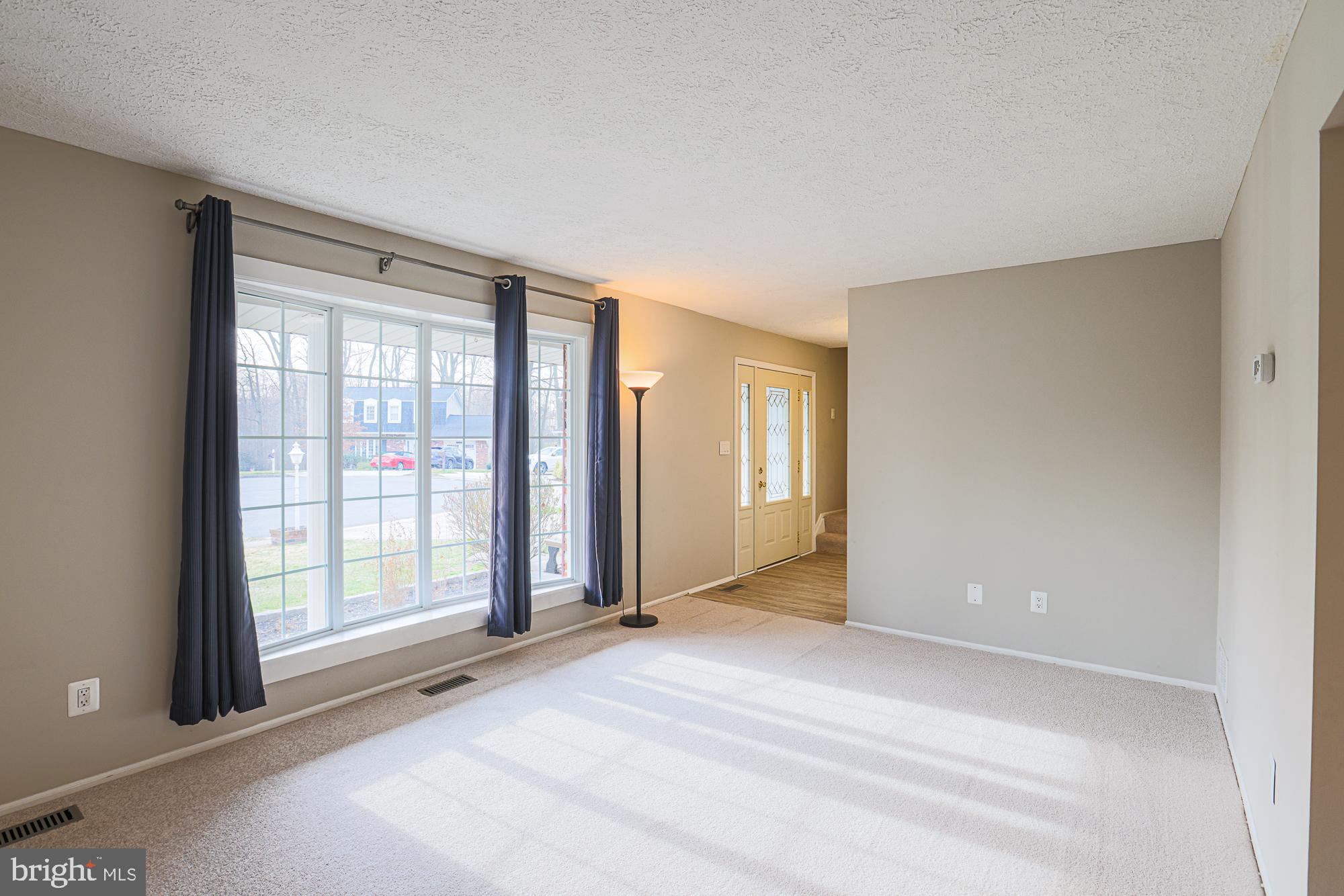 4402 Macworth Place Nottingham, MD 21236 - Photo 4 of 36 a view of an empty room with a window