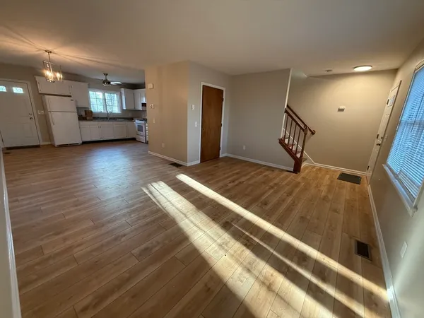 a bedroom with a bed and cabinets