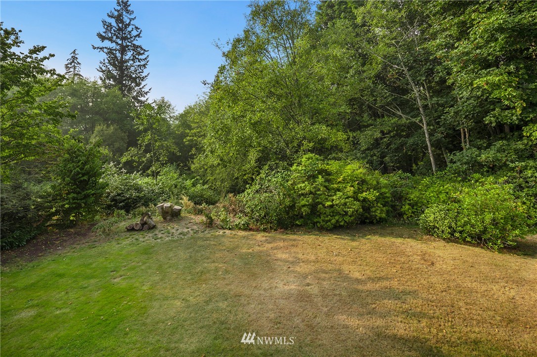 422 Center Place Everett, WA 98203 - Photo 9 of 34 a view of a field with trees in the background
