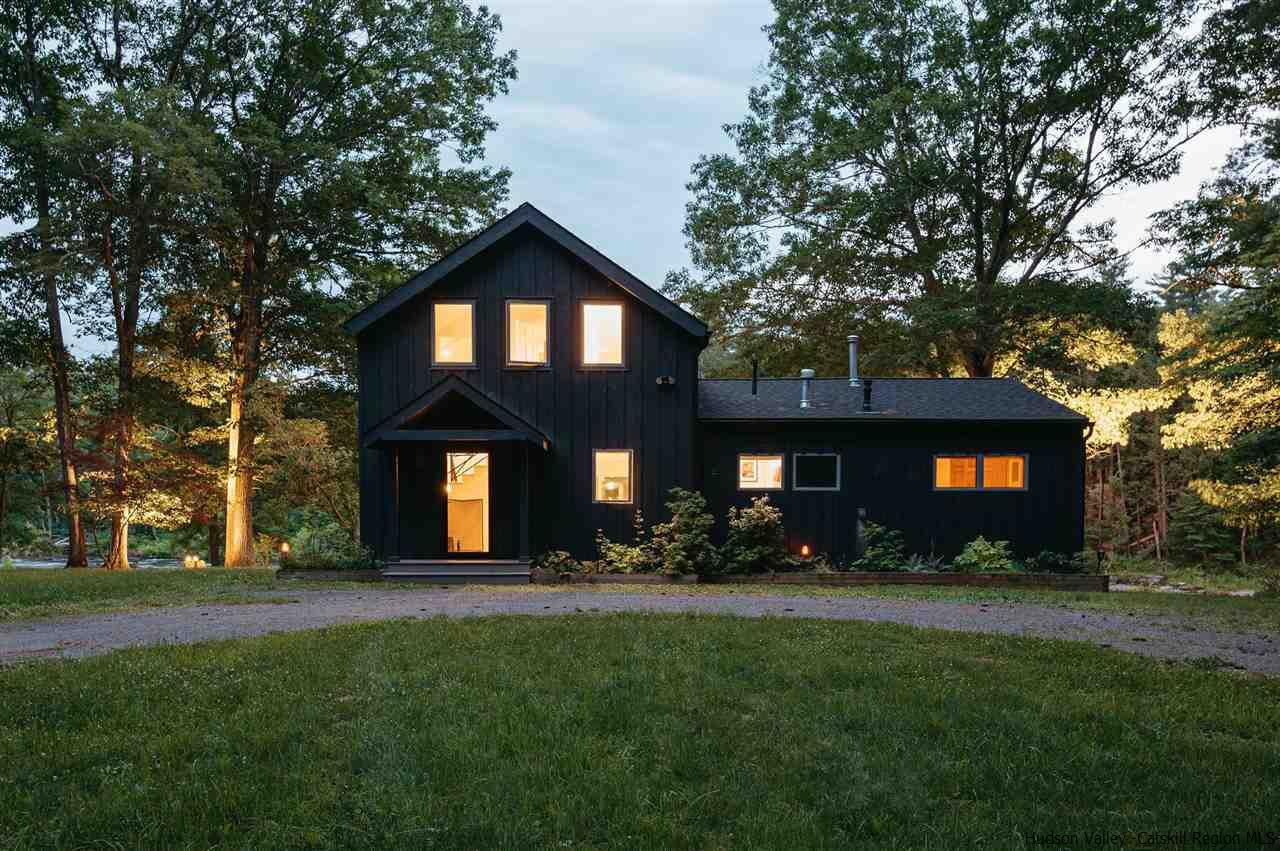 172 Crystal Point Road Cairo, NY 12431 - Photo 1 of 35 a front view of a house with a yard