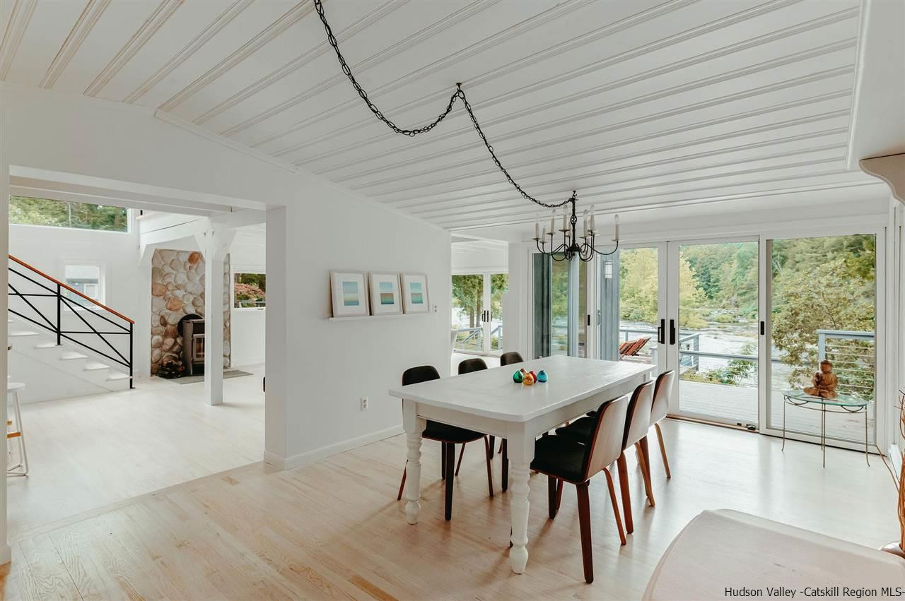 172 Crystal Point Road Cairo, NY 12431 - Photo 13 of 35 a view of a dining room with furniture window and outside view
