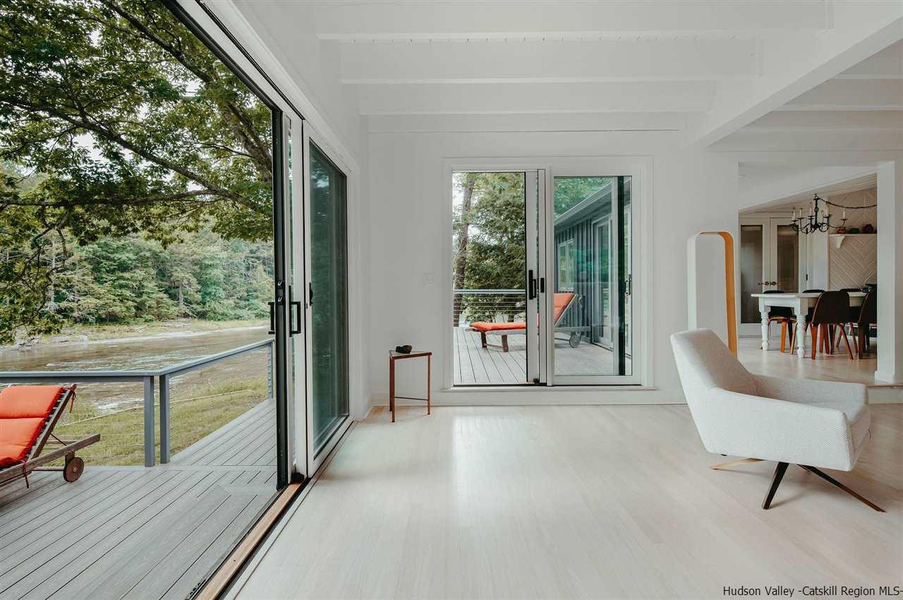 172 Crystal Point Road Cairo, NY 12431 - Photo 14 of 35 a view of a balcony with furniture and a potted plant