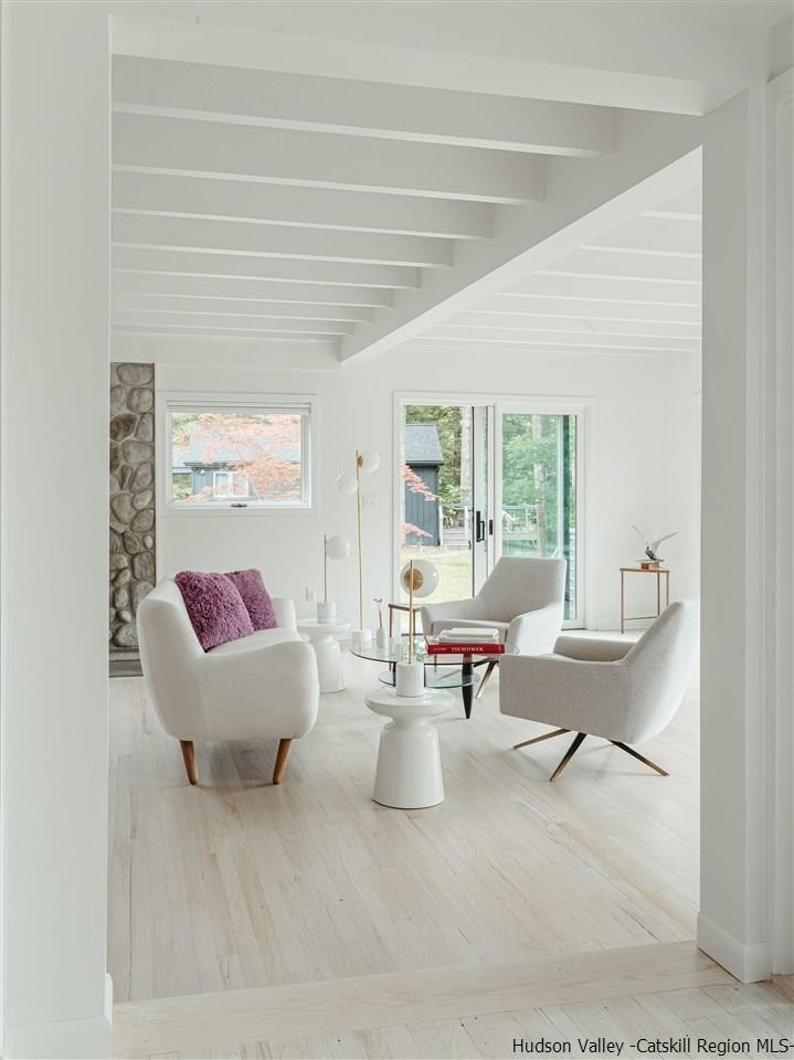 172 Crystal Point Road Cairo, NY 12431 - Photo 15 of 35 a living room with furniture and a large window