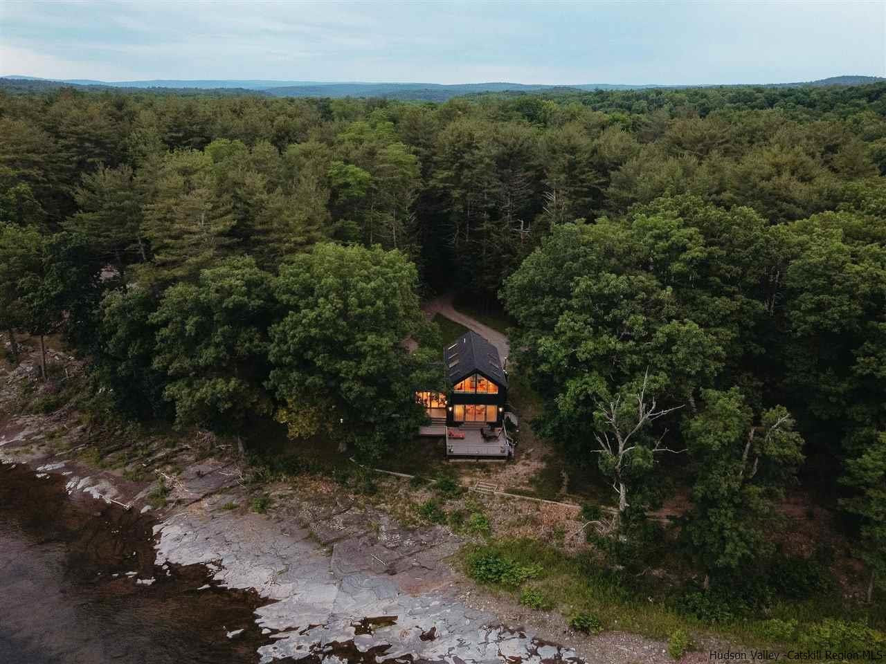172 Crystal Point Road Cairo, NY 12431 - Photo 27 of 35 a view of a trees in a field