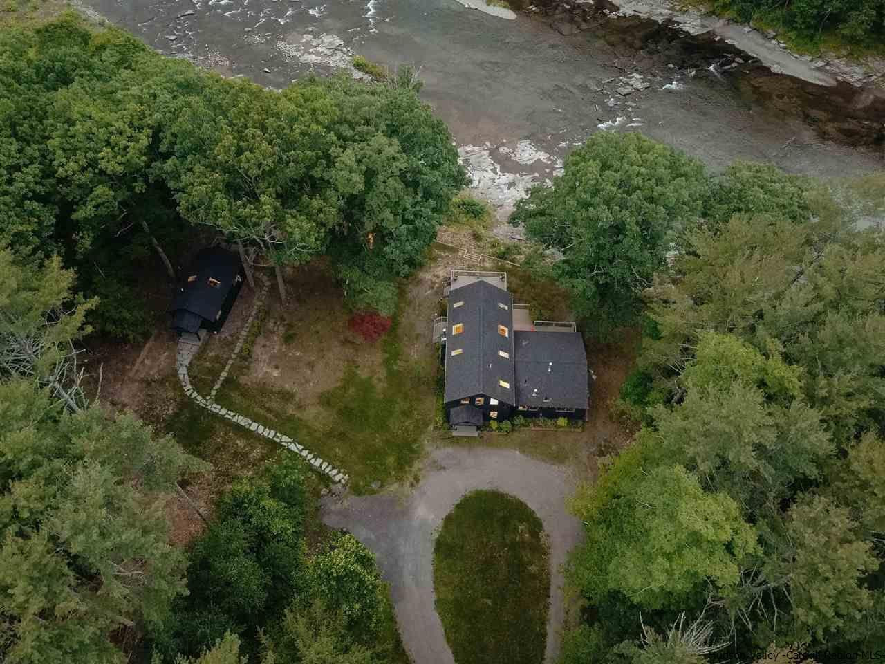 172 Crystal Point Road Cairo, NY 12431 - Photo 30 of 35 an aerial view of residential house with outdoor space and trees all around