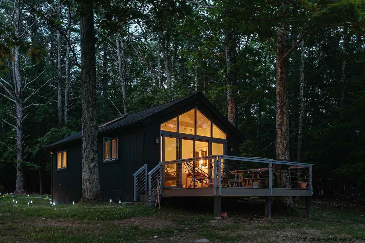 172 Crystal Point Road Cairo, NY 12431 - Photo 3 of 35 a view of house with backyard and sitting area