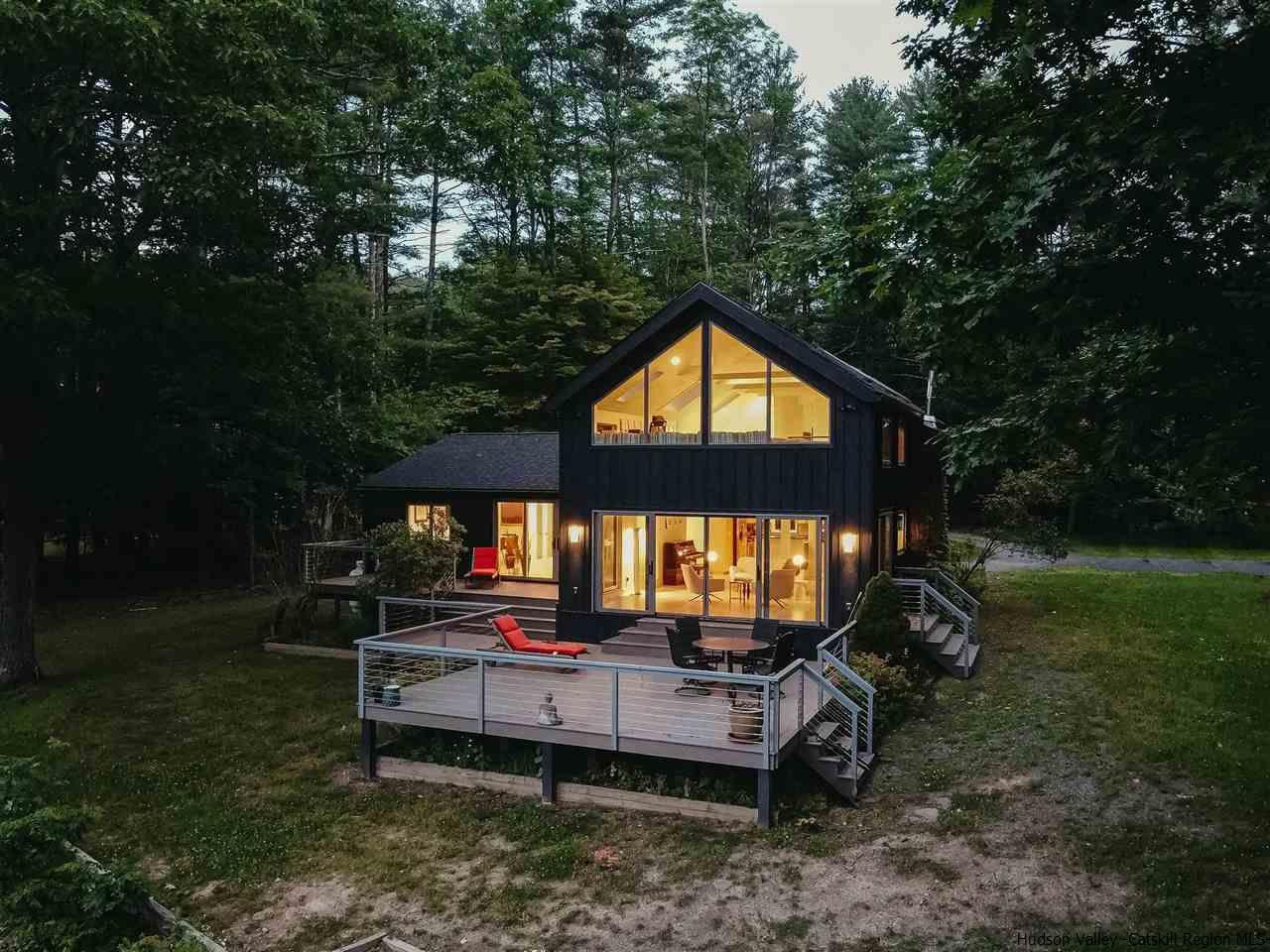172 Crystal Point Road Cairo, NY 12431 - Photo 4 of 35 a backyard of a house with table and chairs