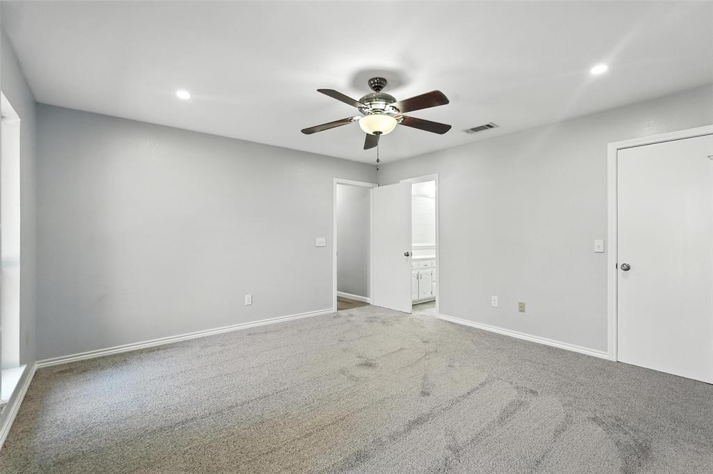 1402 Country Lane Allen, TX 75002 - Photo 17 of 39 Unfurnished bedroom featuring ensuite bathroom, recessed lighting, carpet flooring, and ceiling fan