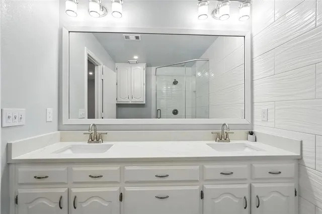 a bathroom with a toilet and shower