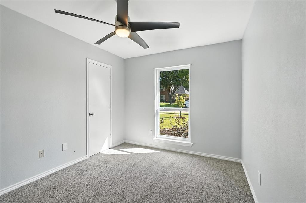 1402 Country Lane Allen, TX 75002 - Photo 26 of 39 Carpeted spare room featuring baseboards and ceiling fan
