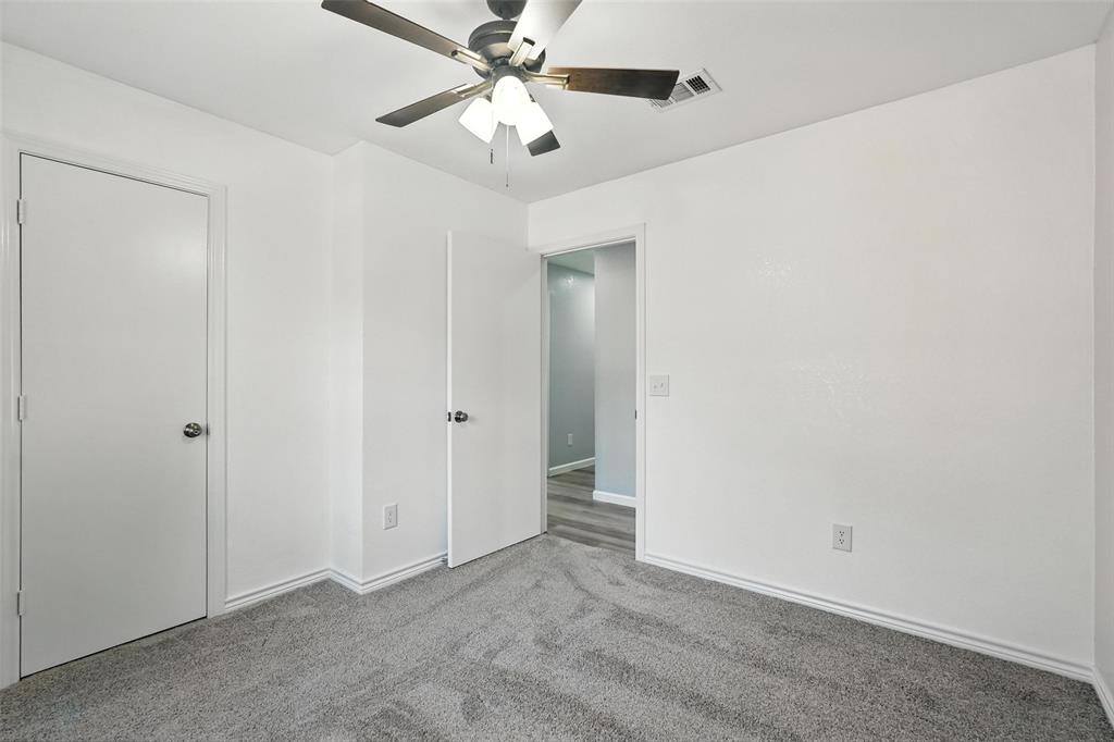 1402 Country Lane Allen, TX 75002 - Photo 29 of 39 Unfurnished bedroom featuring carpet flooring and ceiling fan