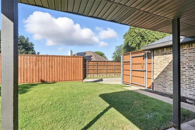 a view of a backyard with a garden