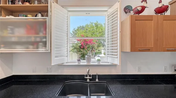 a view of a hallway with a window
