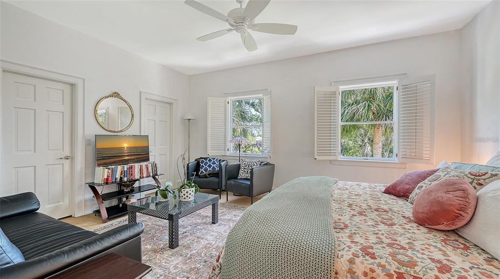 33 Bishopscourt Road, Unit 118 Osprey, FL 34229 - Photo 26 of 69 a living room with furniture and a window