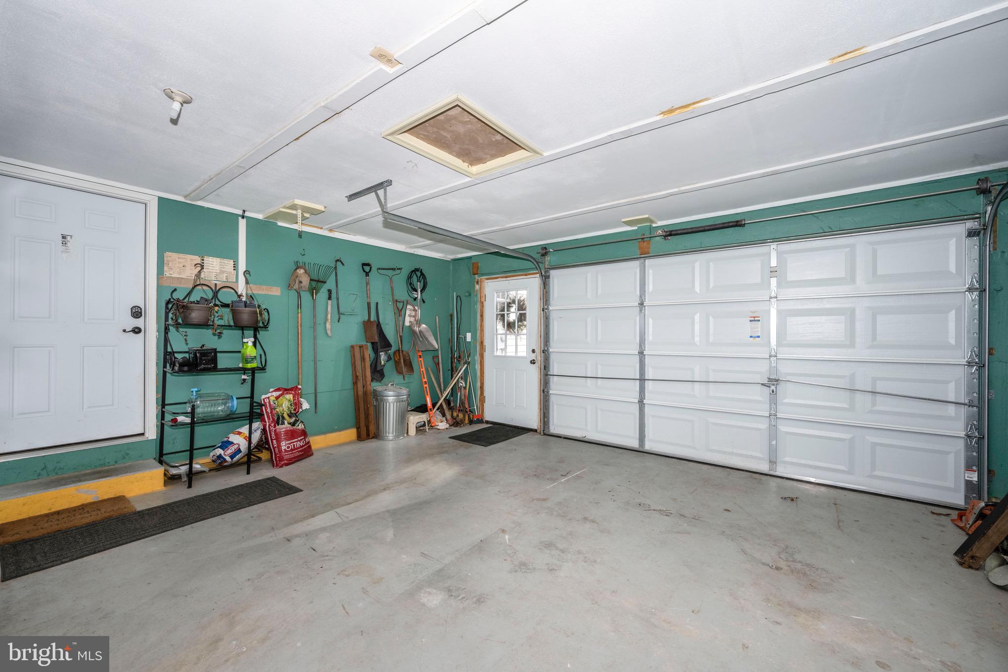 3609 Roop Road New Windsor, MD 21776 - Photo 48 of 72 Vibrant Garage, w/ plenty of workspace