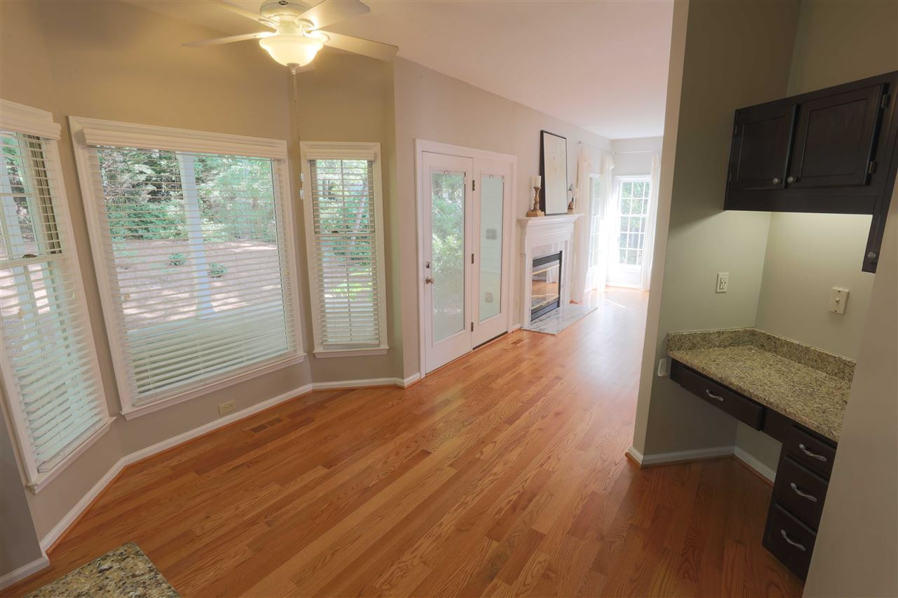 5625 Barham Court Raleigh, NC 27613 - Photo 9 of 23 Built in desk area in kitchen