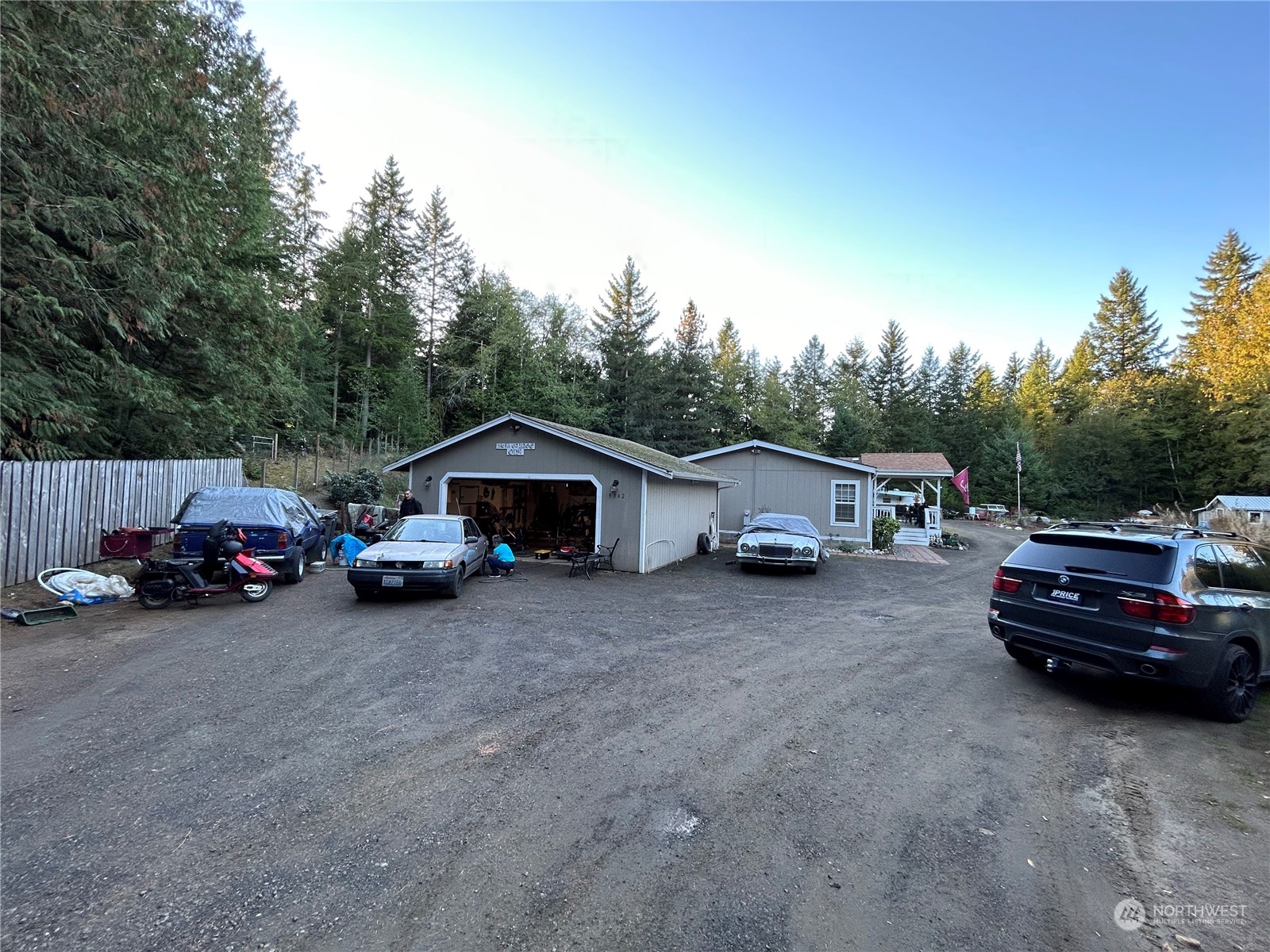 9342 Phillips Road Southeast Port Orchard, WA 98367 - Photo 3 of 12 a view of a car in front of house