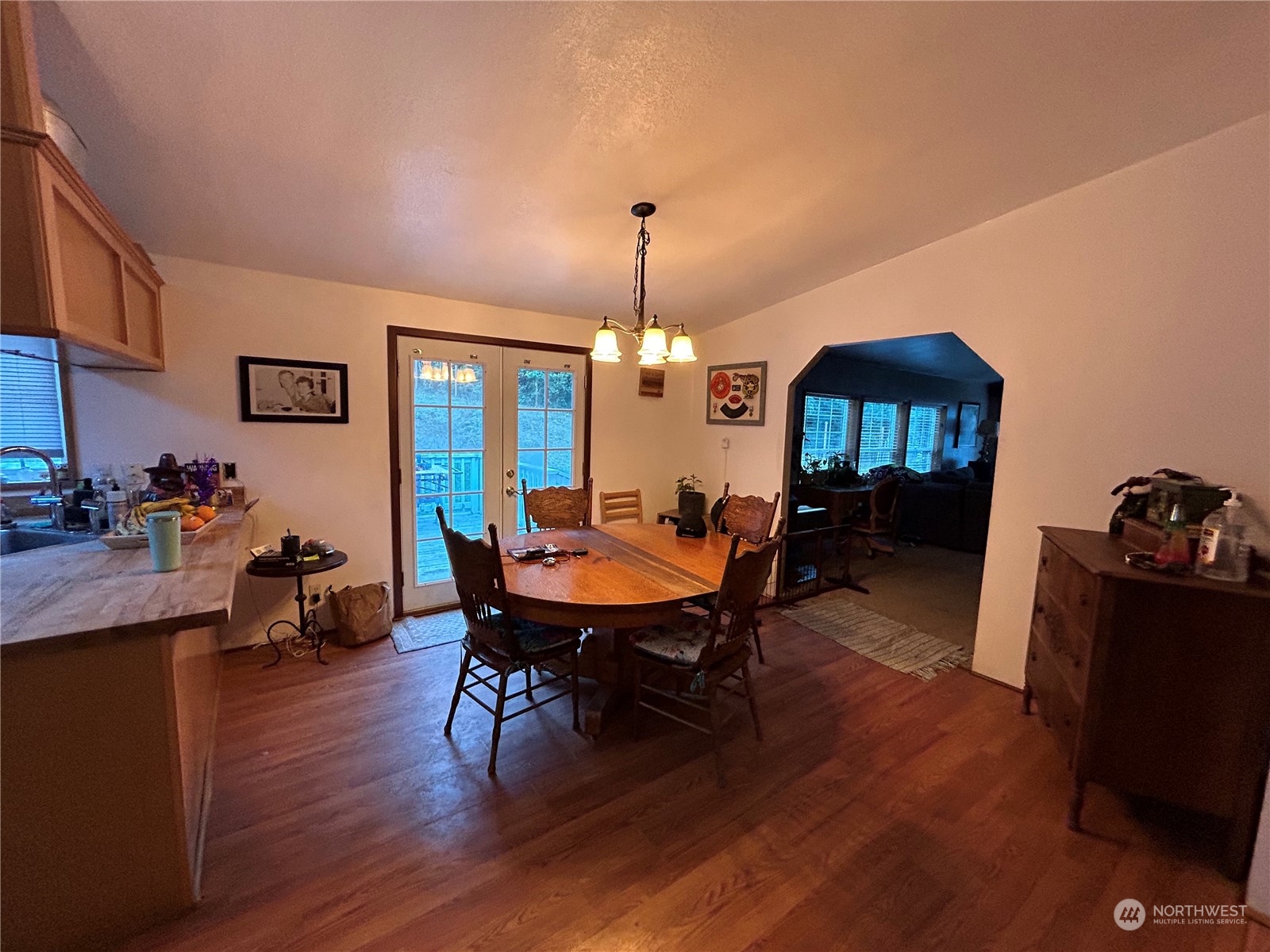 9342 Phillips Road Southeast Port Orchard, WA 98367 - Photo 6 of 12 a view of a dining room with furniture window and wooden floor