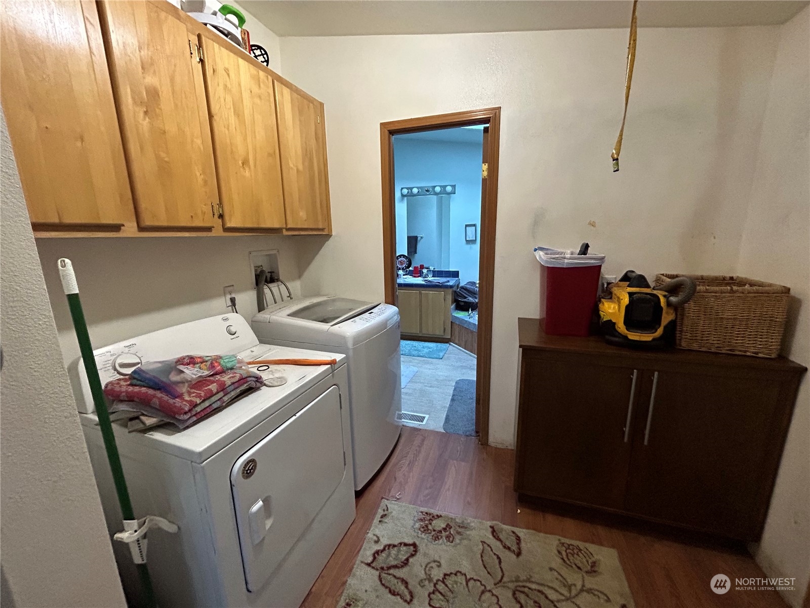 9342 Phillips Road Southeast Port Orchard, WA 98367 - Photo 8 of 12 a kitchen with a sink and cabinets