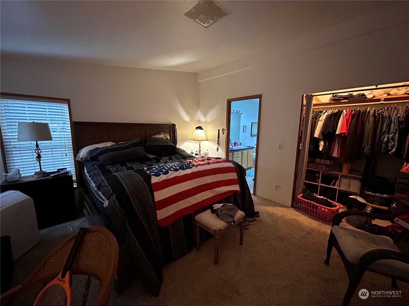 9342 Phillips Road Southeast Port Orchard, WA 98367 - Photo 9 of 12 a bedroom with a bed and a closet