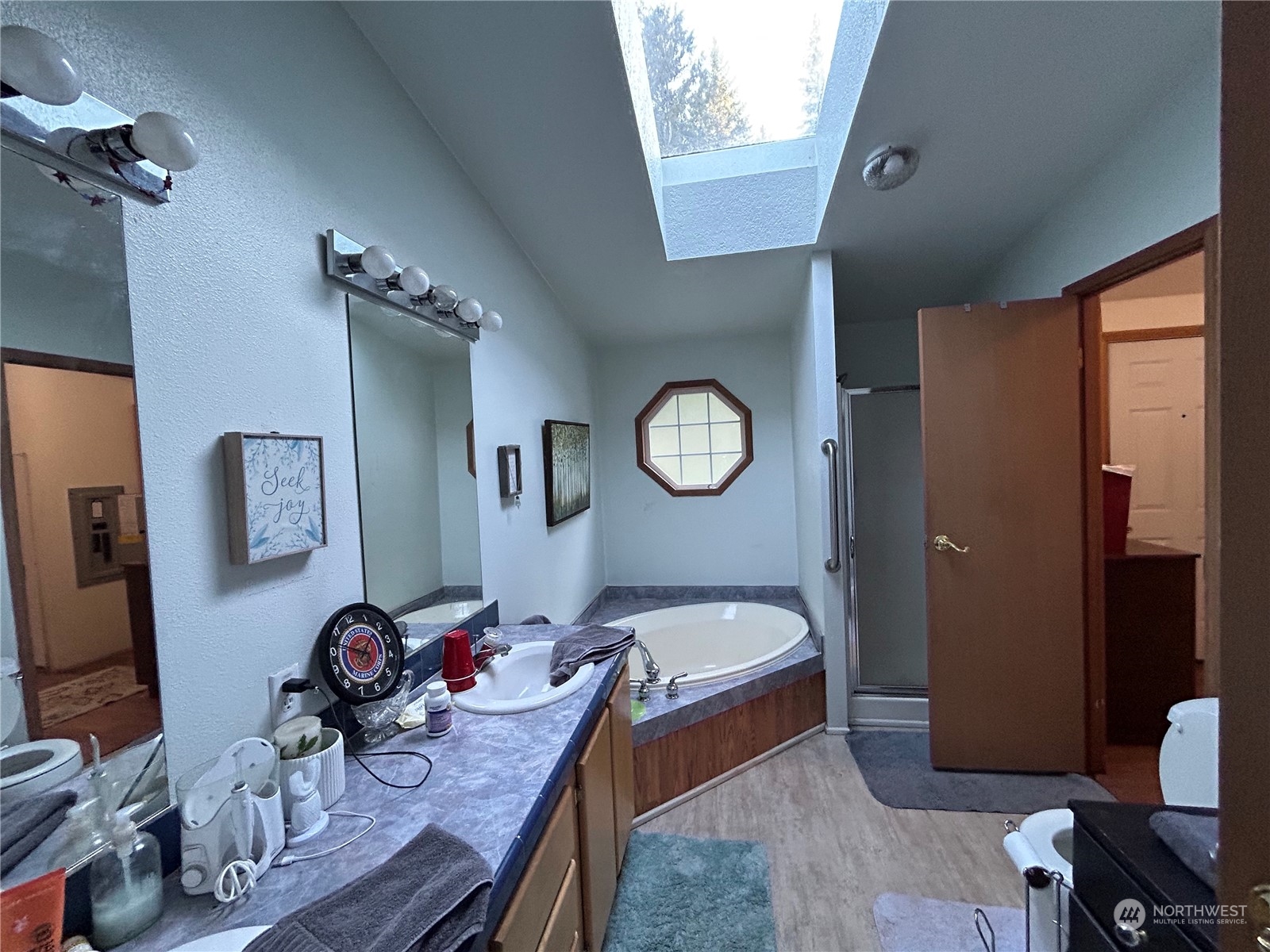 9342 Phillips Road Southeast Port Orchard, WA 98367 - Photo 10 of 12 a living room with furniture and a mirror