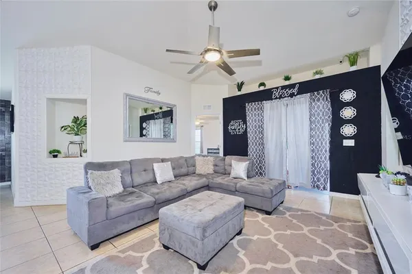 a kitchen with stainless steel appliances granite countertop a refrigerator stove and microwave