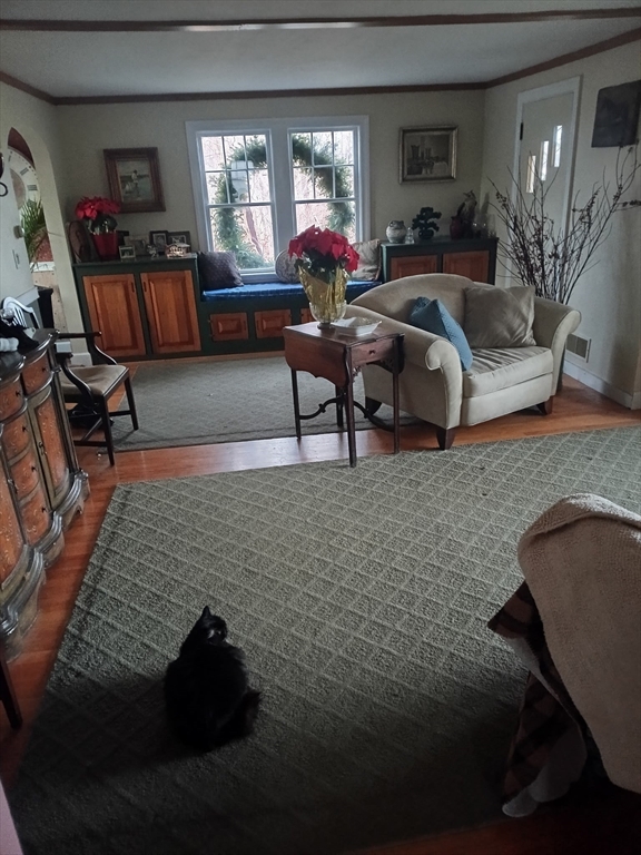 207 Topsfield Road Wenham, MA 01984 - Photo 12 of 18 a living room with furniture chess board and a flat screen tv