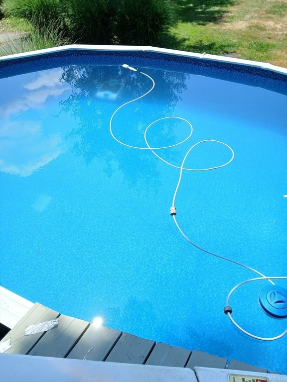 207 Topsfield Road Wenham, MA 01984 - Photo 16 of 18 a view of a swimming pool and window