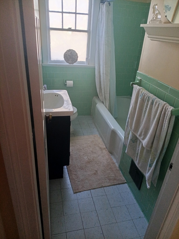 207 Topsfield Road Wenham, MA 01984 - Photo 16 of 18 a view of a bathroom with a sink and a washer