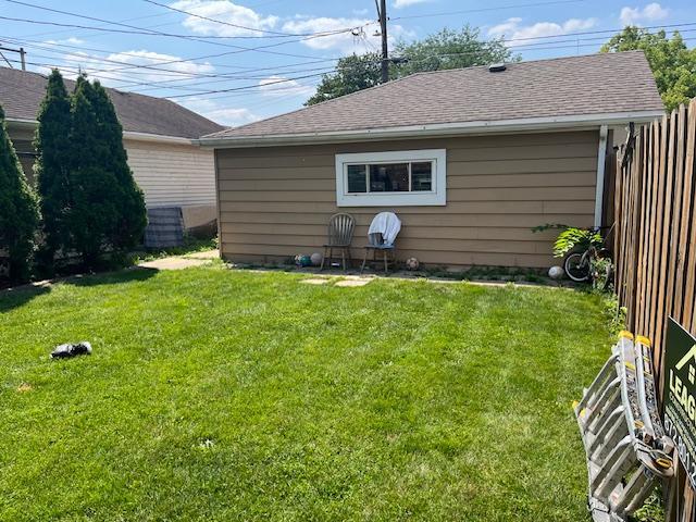 6100 South Kenneth Avenue, Unit 2 Chicago, IL 60629 - Photo 14 of 14 a front view of house with yard