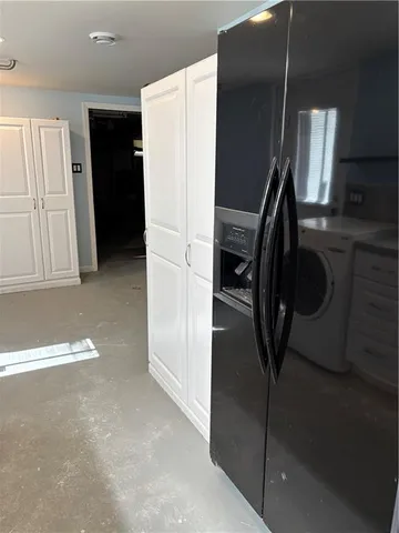 a view of entryway and workspace