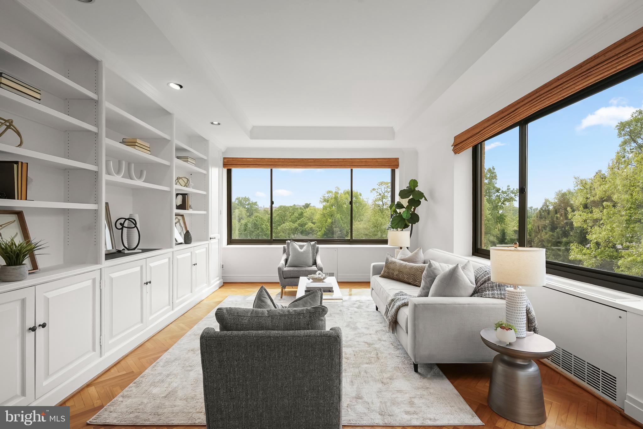 2700 Calvert Street Northwest, Unit 416 Washington, DC 20008 - Photo 14 of 33 a living room with furniture and a large window