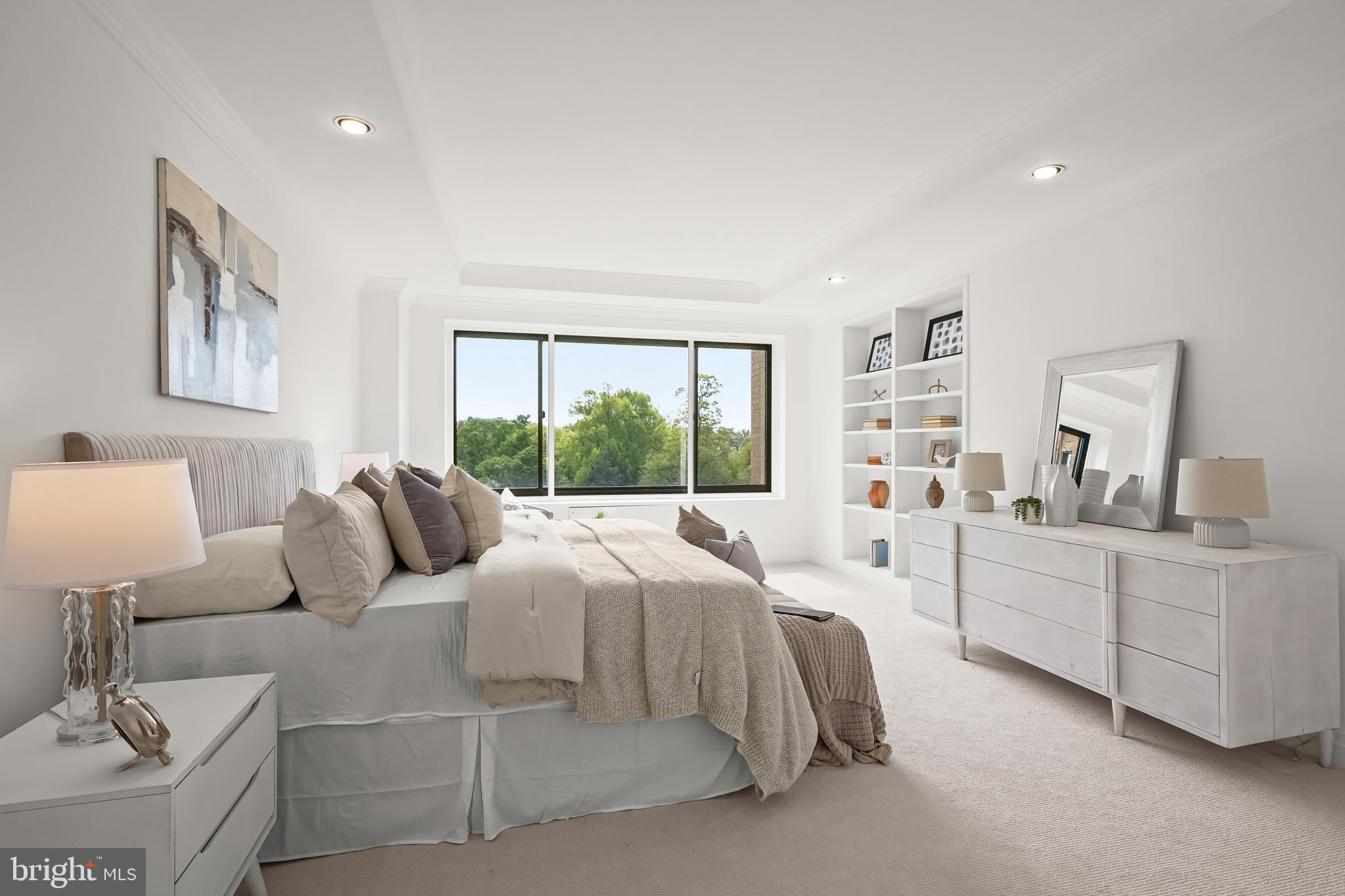 2700 Calvert Street Northwest, Unit 416 Washington, DC 20008 - Photo 17 of 33 a large white bed in a white room