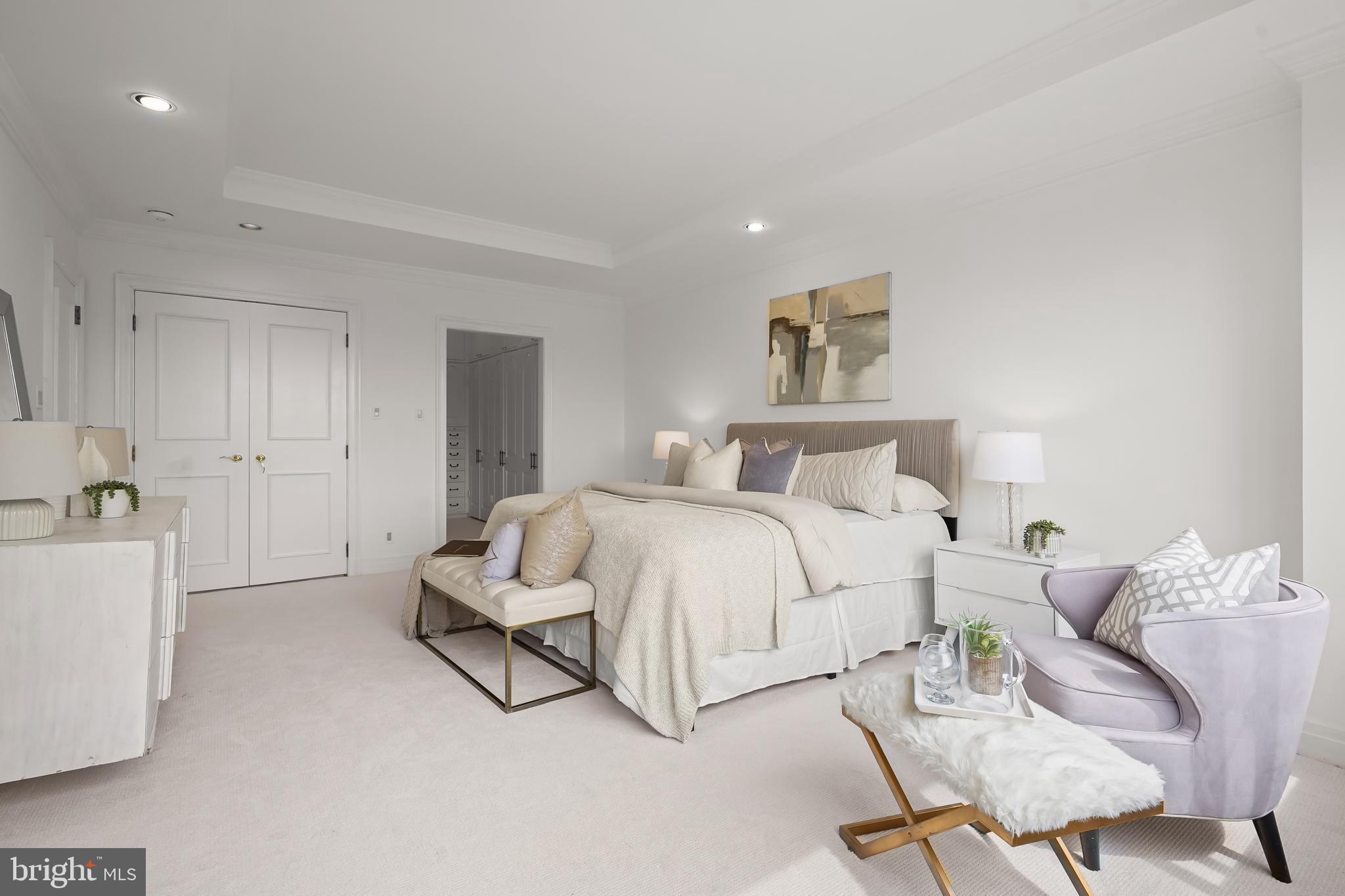2700 Calvert Street Northwest, Unit 416 Washington, DC 20008 - Photo 18 of 33 a spacious bedroom with a bed and furniture
