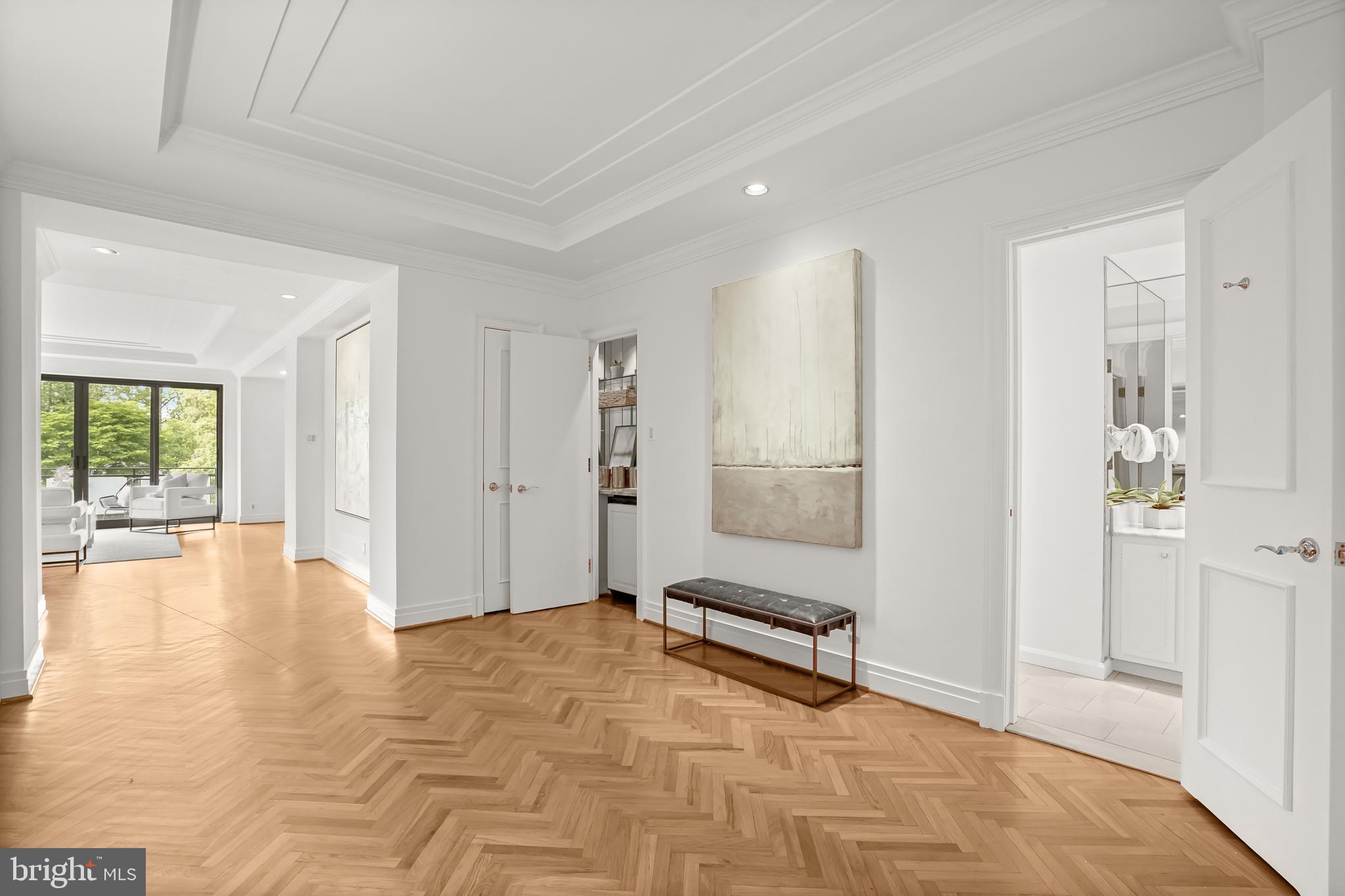 2700 Calvert Street Northwest, Unit 416 Washington, DC 20008 - Photo 3 of 33 a view of an empty room with glass door