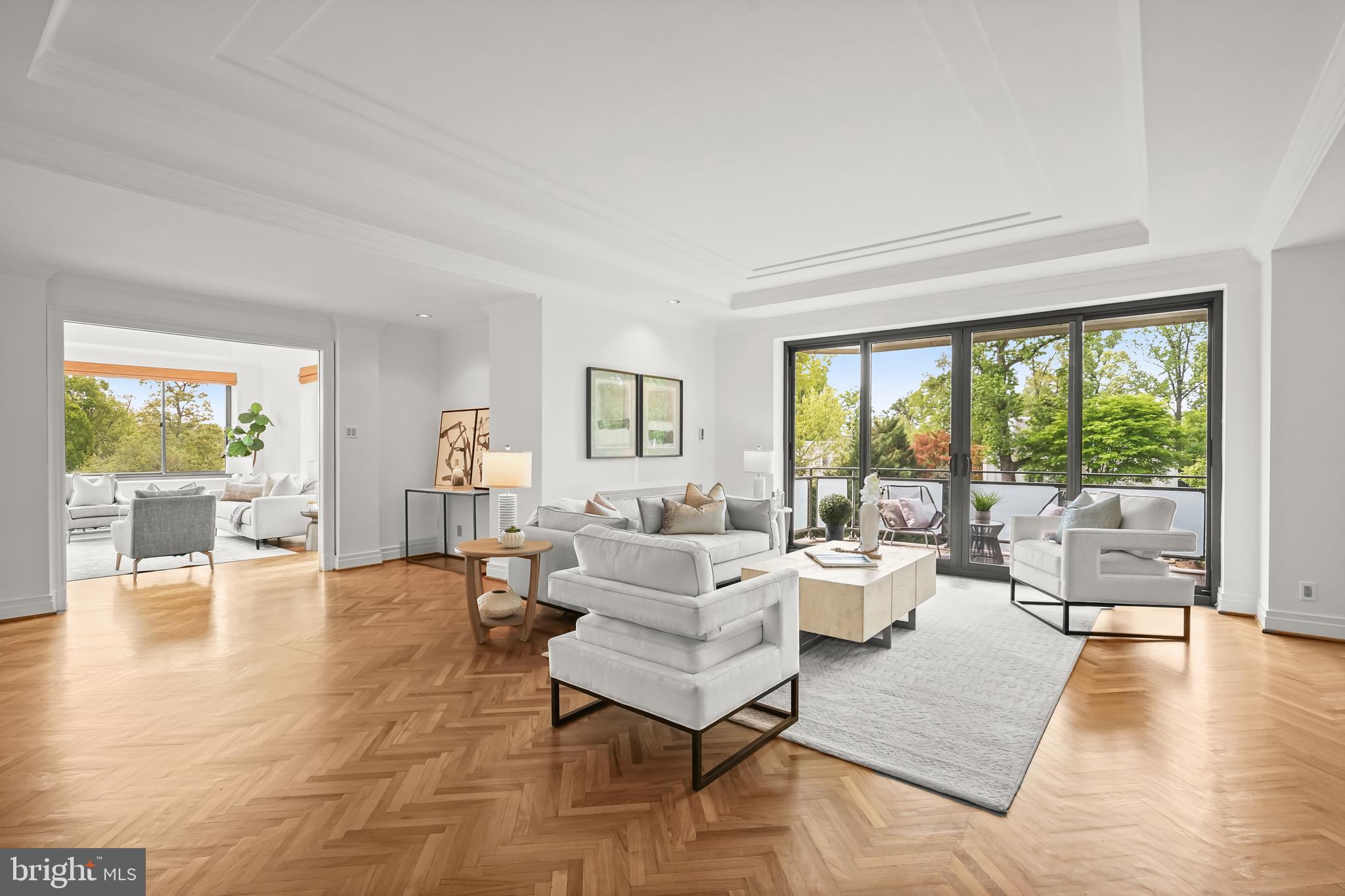 2700 Calvert Street Northwest, Unit 416 Washington, DC 20008 - Photo 6 of 33 a living room with furniture and a large window
