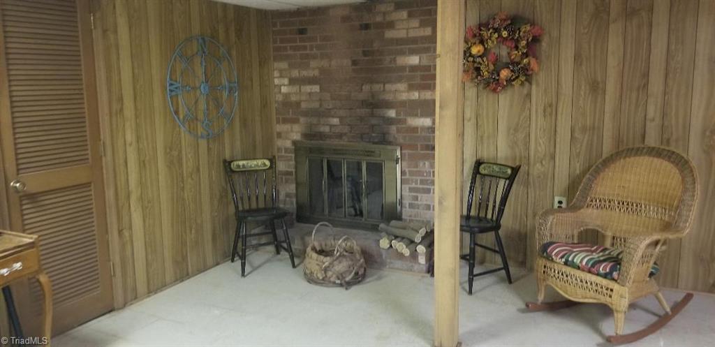 2452 Collinstown Road Stuart, VA 24171 - Photo 33 of 49 Finished Basement Room with Wood Burning Fireplace