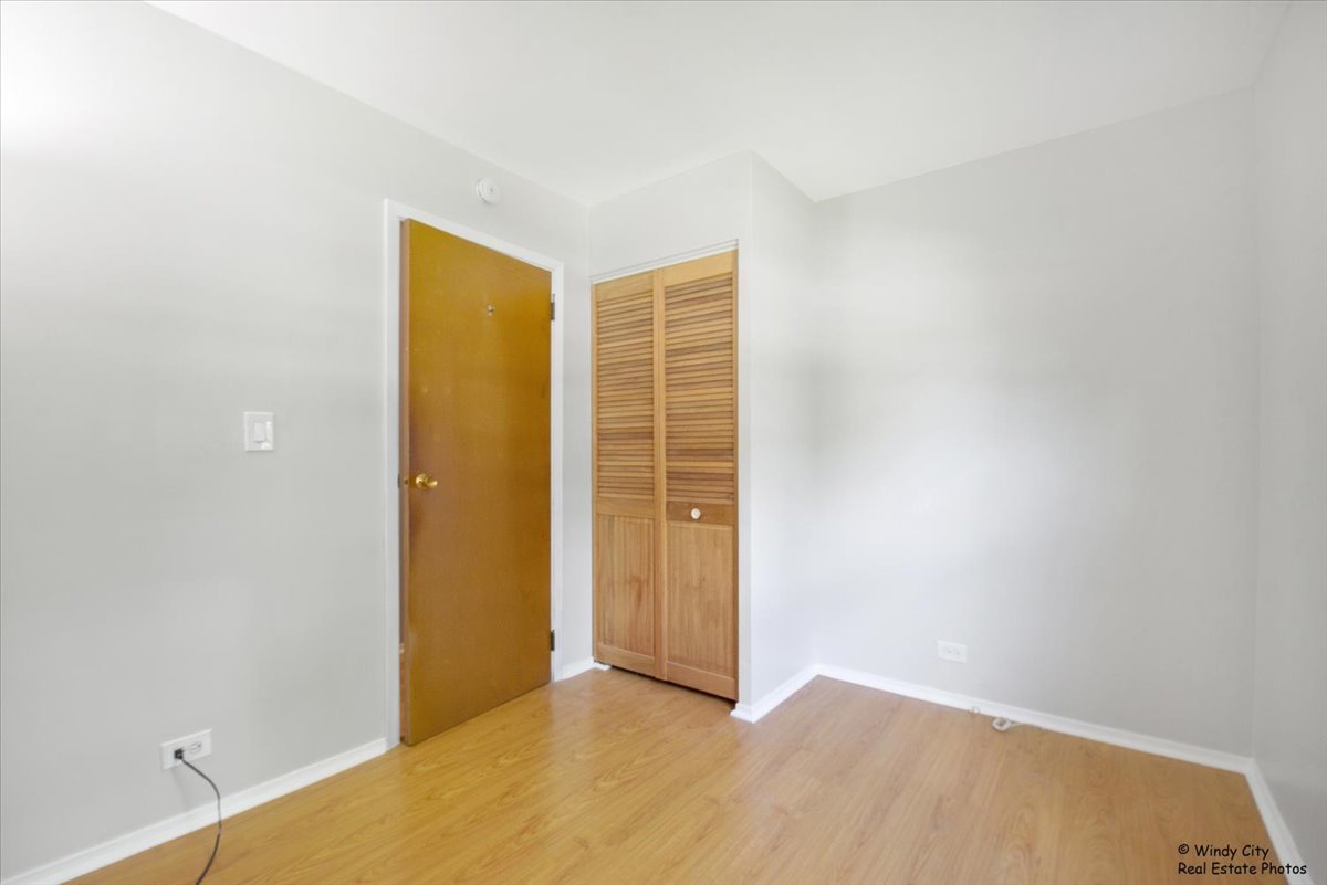 383 Raupp Boulevard Buffalo Grove, IL 60089 - Photo 18 of 40 a view of an empty room with closet