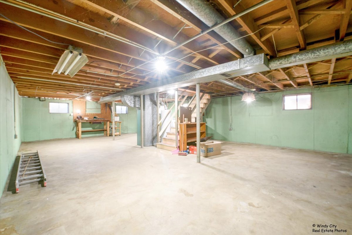 383 Raupp Boulevard Buffalo Grove, IL 60089 - Photo 21 of 40 a view of a room with wooden walls