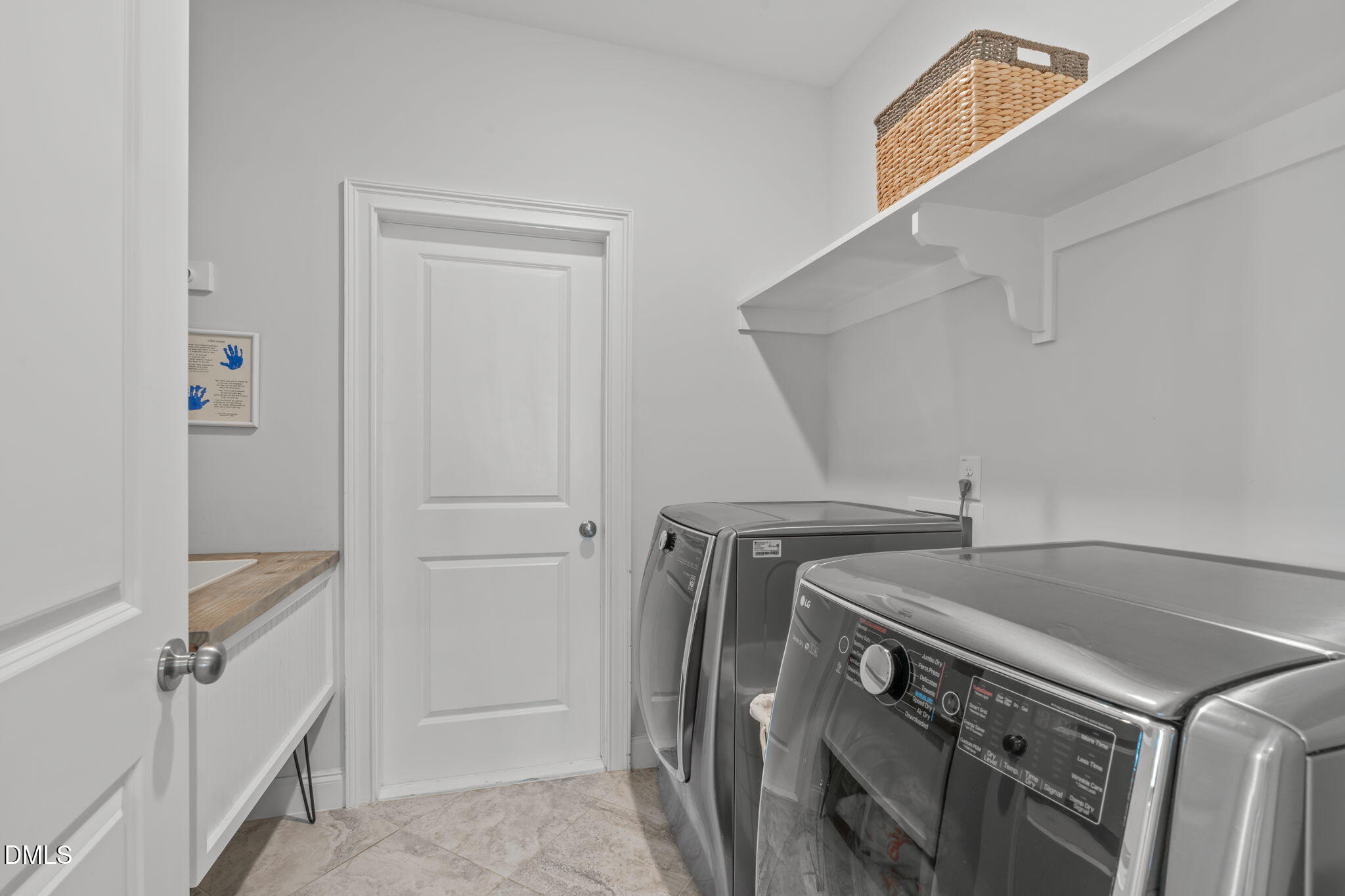 4144 Olde Judd Drive Willow Spring, NC 27592 - Photo 34 of 52 a utility room with dryer and washer