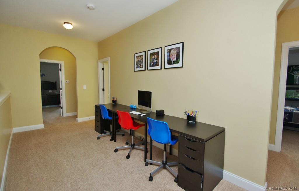 1010 Hamil Ridge Drive, Unit 929 Waxhaw, NC 28173 - Photo 16 of 24 a view of a workspace with furniture