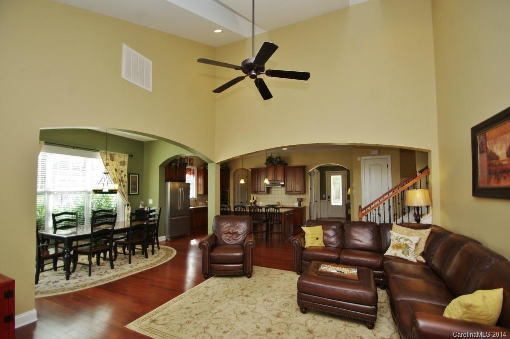1010 Hamil Ridge Drive, Unit 929 Waxhaw, NC 28173 - Photo 3 of 24 a living room with furniture and a wooden floor