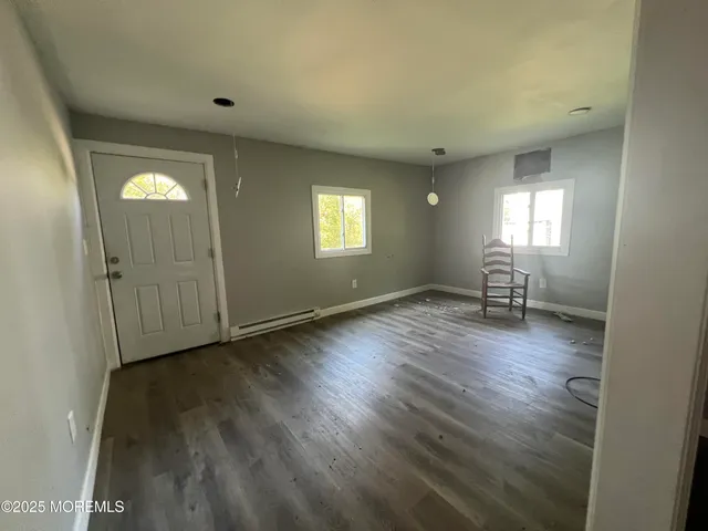 a kitchen with a sink stove and refrigerator