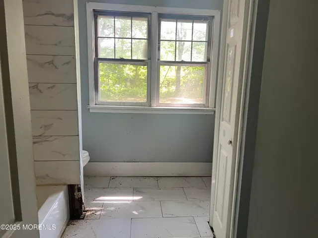 a view of a field with trees