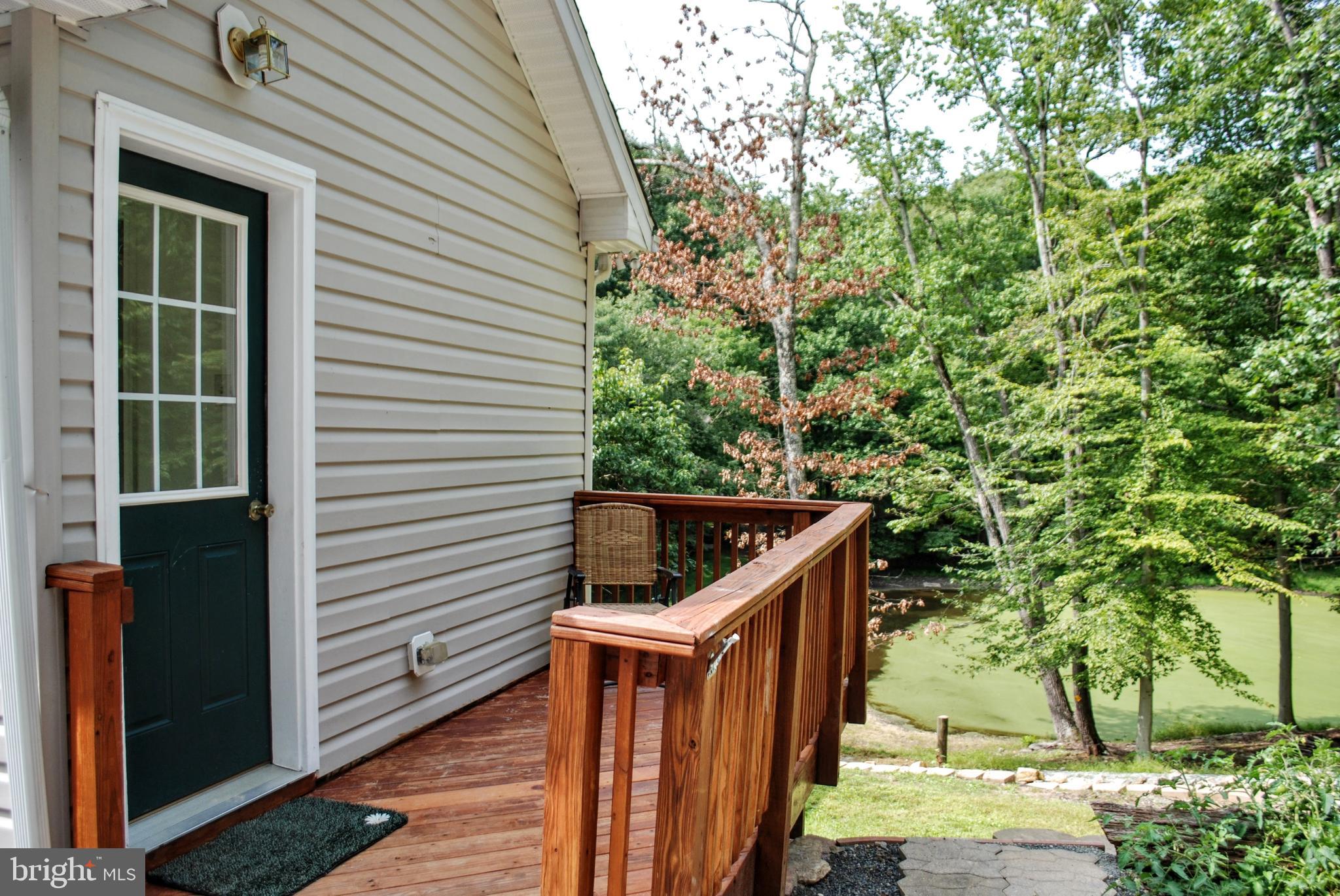 5902 Moser Road Boonsboro, MD 21713 - Photo 31 of 37 The side door has a small deck with a view...