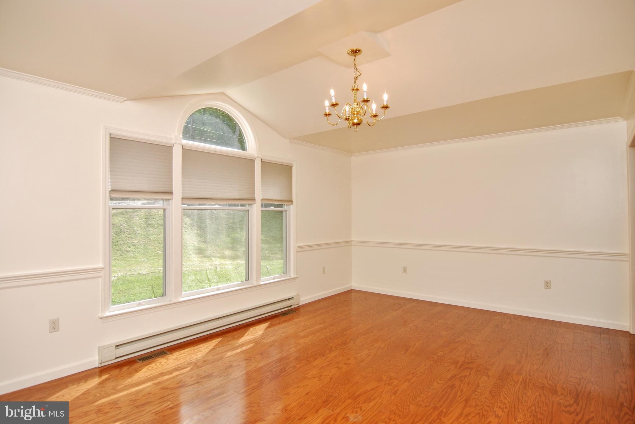 5902 Moser Road Boonsboro, MD 21713 - Photo 5 of 37 And features HW floors and a cathedral ceiling.