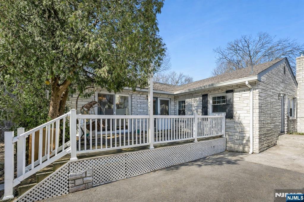 140 Francisco Avenue Rutherford, NJ 07070 - Photo 1 of 25 a view of a house with a deck