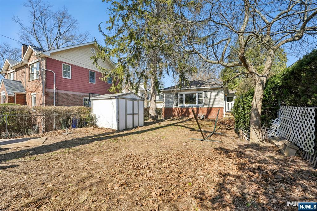 140 Francisco Avenue Rutherford, NJ 07070 - Photo 22 of 25 a house with a bench and bench