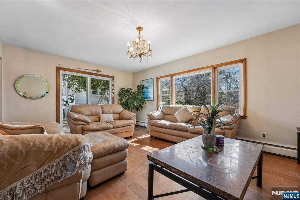 140 Francisco Avenue Rutherford, NJ 07070 - Photo 6 of 25 a living room with furniture and a large window